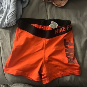 red/orange nike bros